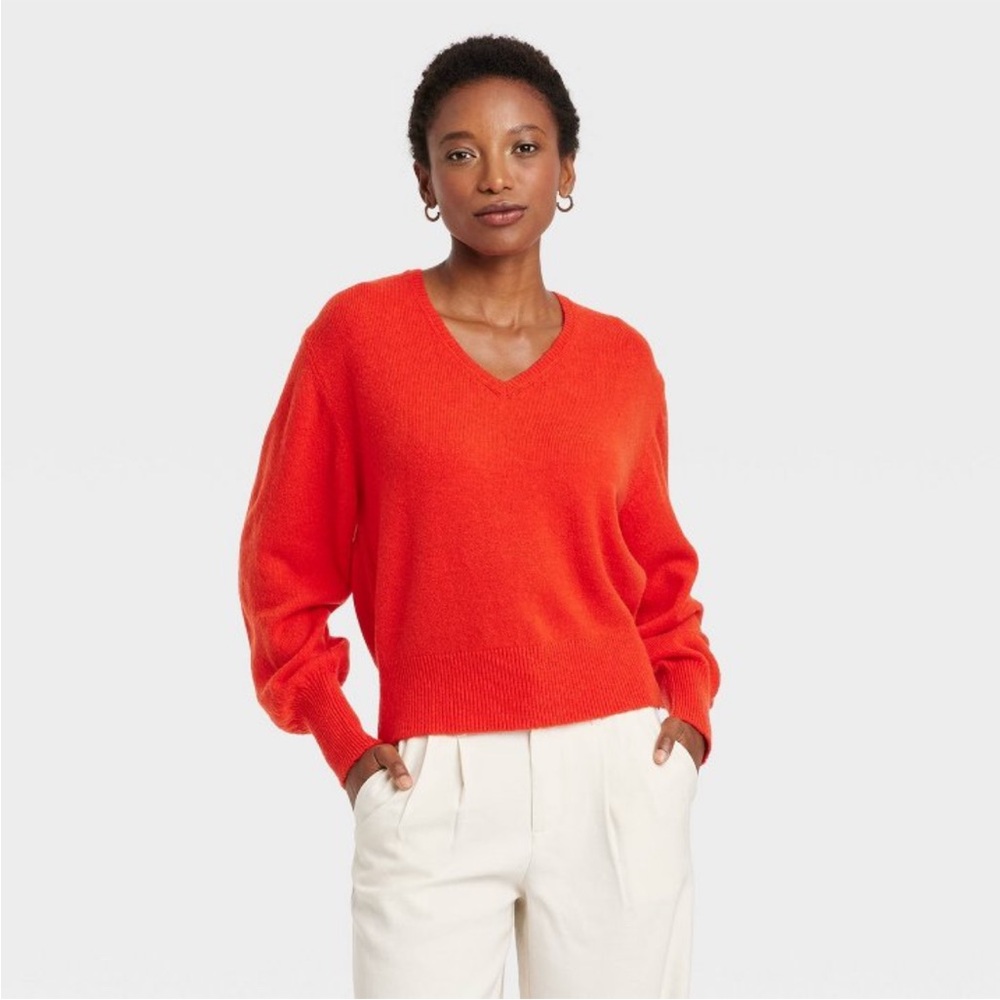 New, red sweater. Medium and small